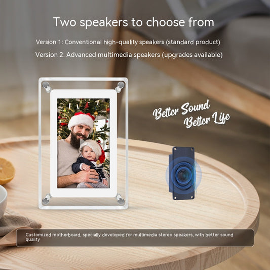 Transparent acrylic digital photo frame presented on a wooden table, with the option to choose from two types of speakers: conventional high-quality or advanced multimedia speakers. The image displayed on the frame shows a man wearing a Santa hat, holding a young child, symbolizing family and holiday cheer.