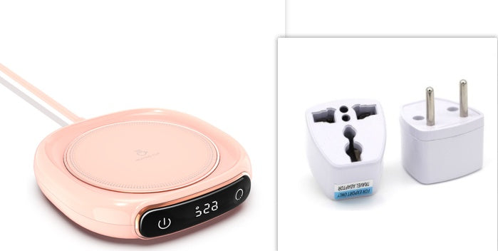 Portable pink mug warmer with digital display and universal plug adapter for global compatibility