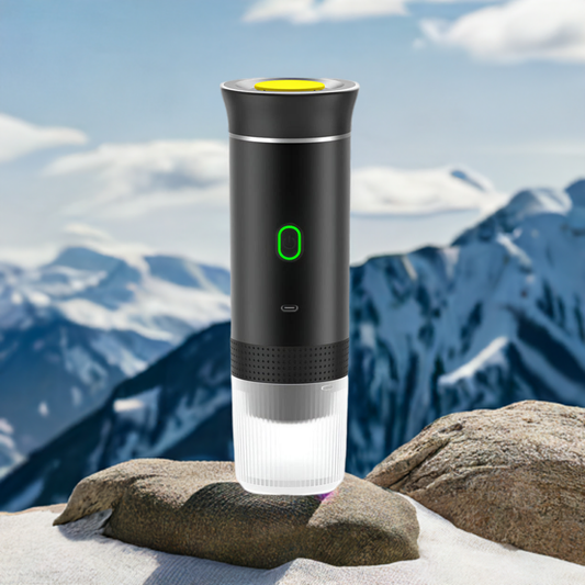 Portable espresso capsule coffee machine with mountain background – designed for outdoor coffee lovers.