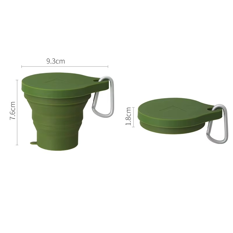 The GoCup™ - Collapsible Travel Mug in green with size details, perfect for compact storage in bags or backpacks for coffee on the go.