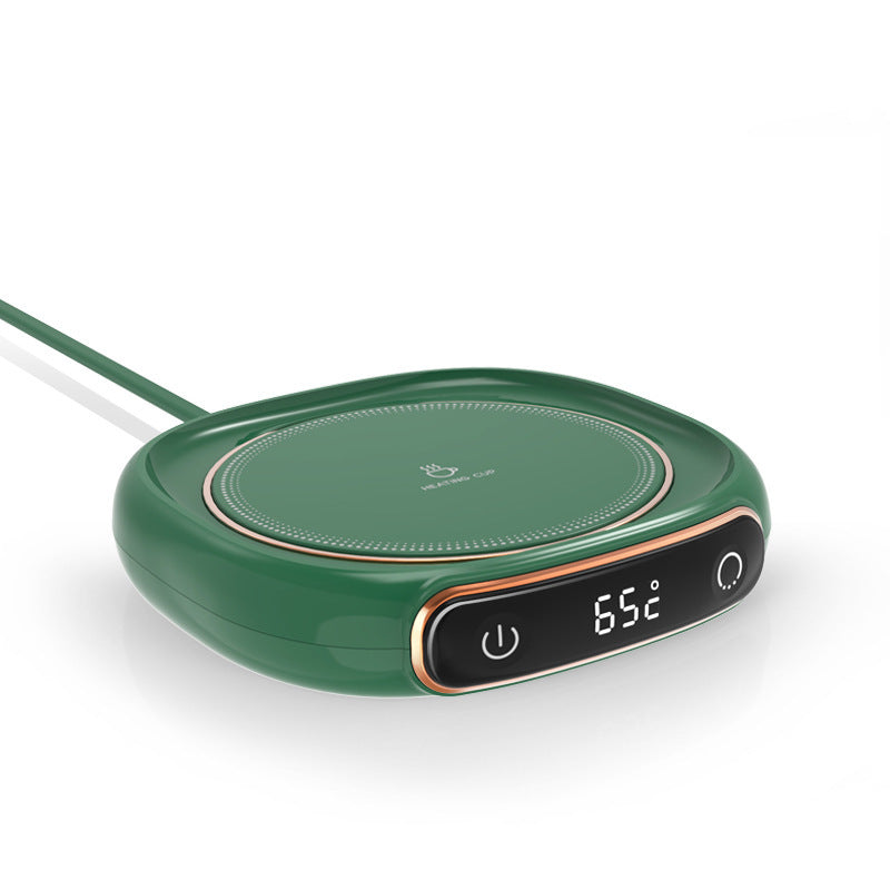 Green thermal coffee mug warmer with LED temperature display set to 65°C