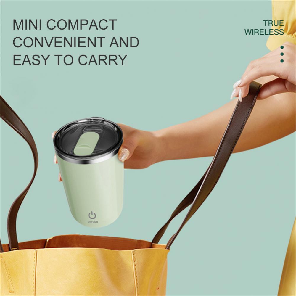 Woman placing AutoMug Pro™ green cup into a yellow handbag for travel
